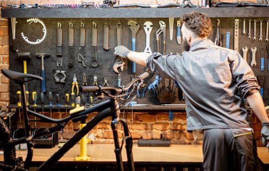 man-taking-tools-for-bicycle-repairing-2025-03-15-18-48-37-utc_lr man-taking-tools-for-bicycle-repairing-2025-03-15-18-48-37-utc_lr