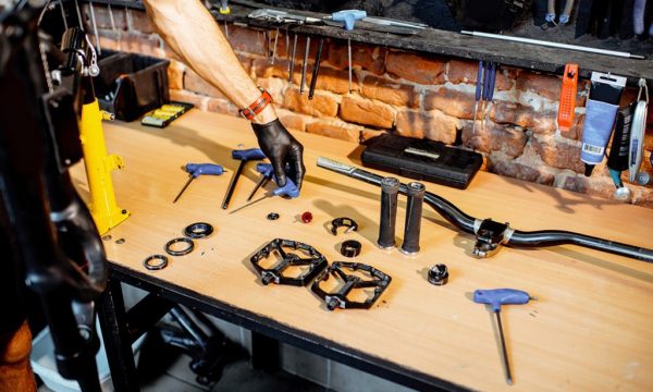 Working place with bicycle parts and wrenches